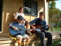 Enjpying the sunshine on Standard Cabin verandah, Pukenui Holiday Park